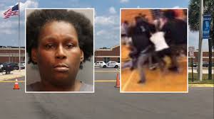 Woman with gun arrested after fight at Ribault High School